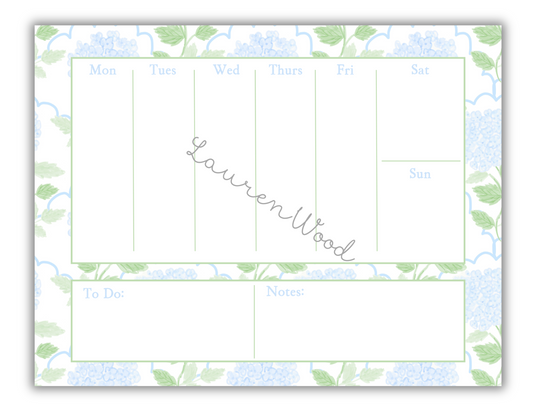 Weekly planner with floral border and 'Lauren Wood' branding
