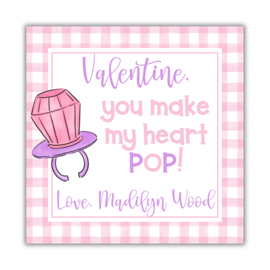 Valentine's Day card with a pink diamond ring and text on a pink and white checkered background